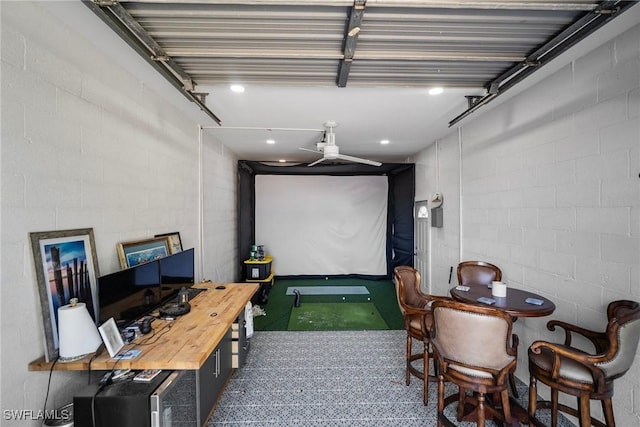 cinema room featuring golf simulator