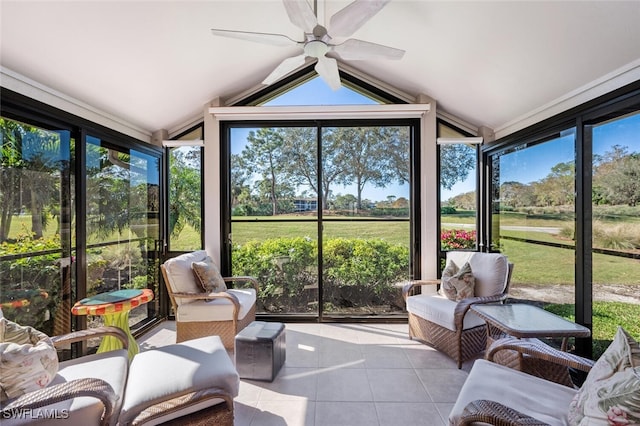 sunroom with lofted ceiling, ceiling fan, and a wealth of natural light