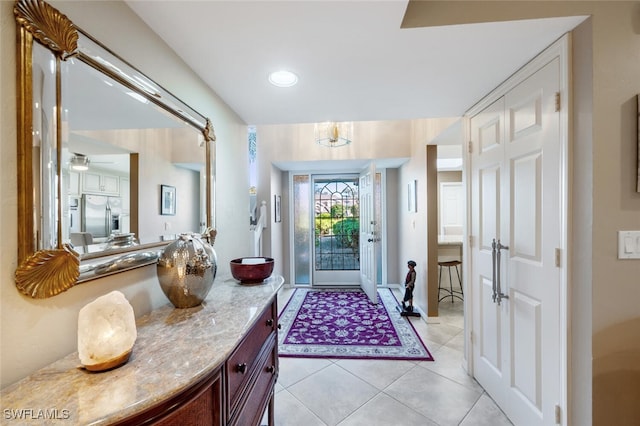 view of tiled foyer entrance