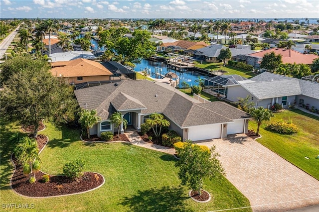 drone / aerial view featuring a water view