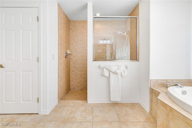 bathroom featuring tile patterned flooring and plus walk in shower