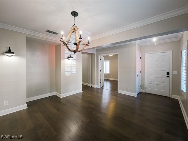 unfurnished dining area with crown molding, dark hardwood / wood-style flooring, and a notable chandelier