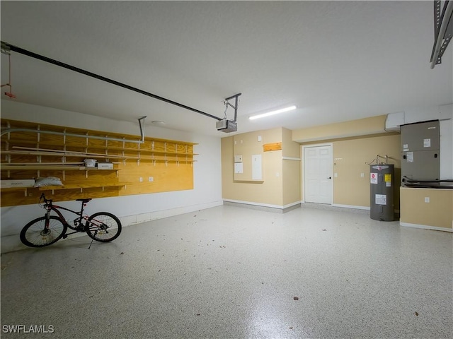 garage featuring electric water heater, heating unit, and a garage door opener