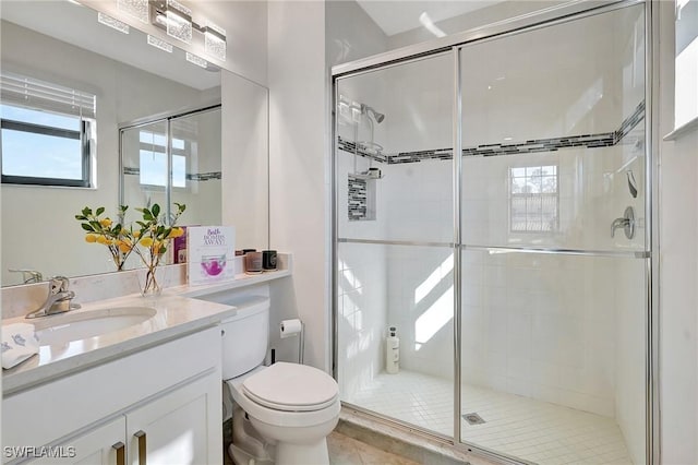 10064 Chesapeake Bay Dr, Fort Myers, FL 33913 - bathroom with a stall shower, toilet, vanity, and plenty of natural light