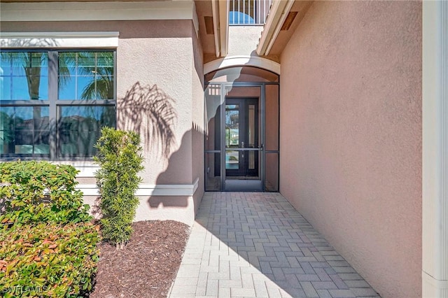 10064 Chesapeake Bay Dr, Fort Myers, FL 33913 - view of exterior entry featuring stucco siding