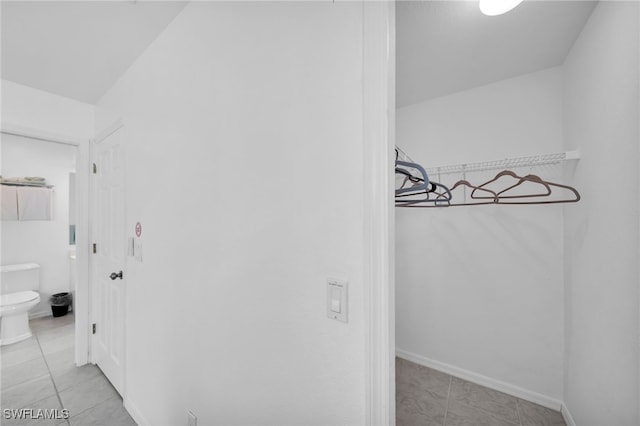 walk in closet featuring tile patterned floors