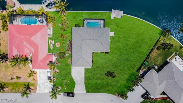 drone / aerial view featuring a water view