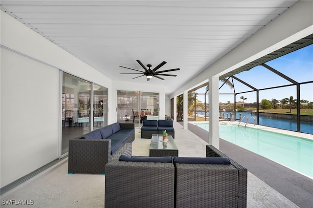view of patio with an outdoor living space, a water view, a lanai, a ceiling fan, and an outdoor pool