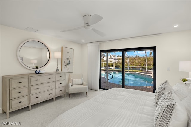 carpeted bedroom featuring access to outside and ceiling fan