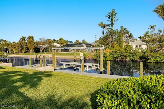 view of dock featuring a yard and a water view