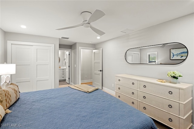 bedroom with connected bathroom, a closet, and ceiling fan