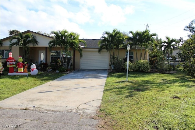 ranch-style house with a garage and a front yard