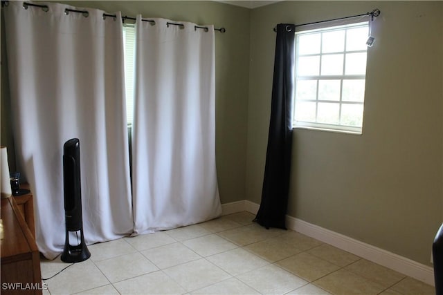 view of tiled spare room