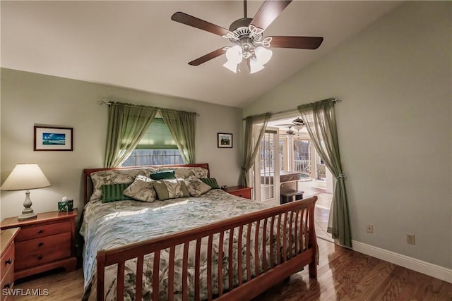 5471 Harborage Dr, Fort Myers, FL 33908 - bedroom featuring a ceiling fan, wood finished floors, baseboards, vaulted ceiling, and access to outside