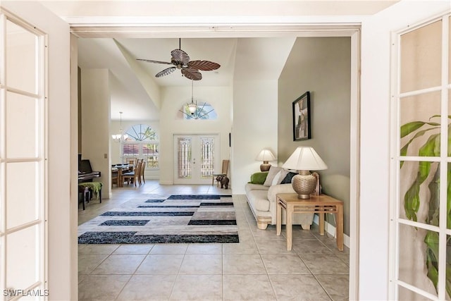 5471 Harborage Dr, Fort Myers, FL 33908 - foyer with light tile patterned floors and ceiling fan