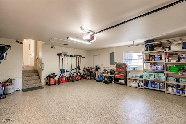 5471 Harborage Dr, Fort Myers, FL 33908 - garage with electric panel and a garage door opener