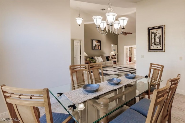 dining area with a chandelier, visible vents, baseboards, and light tile patterned floors