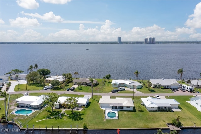 drone / aerial view with a water view