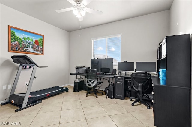 tiled office space with ceiling fan