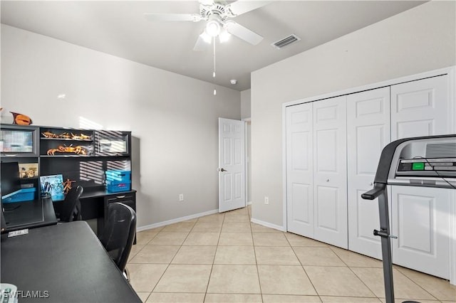 office space with ceiling fan and light tile patterned floors