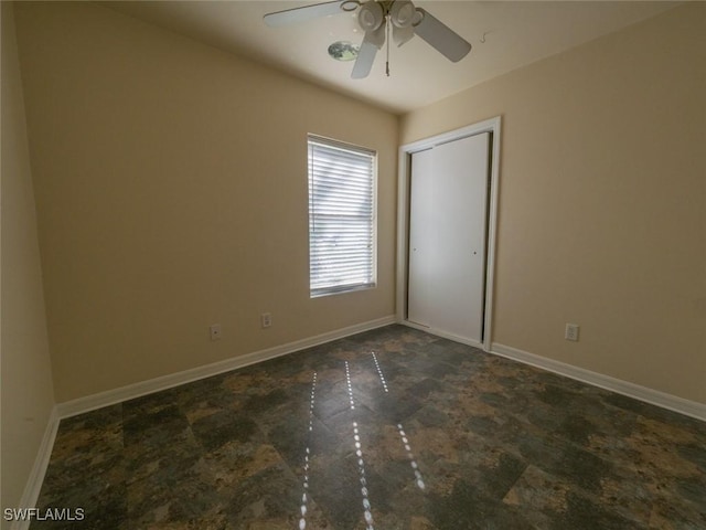 unfurnished room featuring ceiling fan