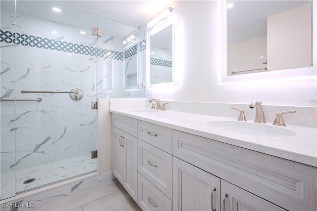 bathroom featuring vanity and walk in shower