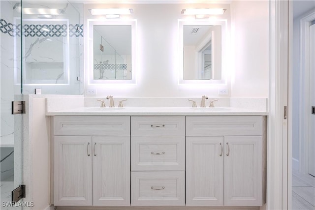 bathroom featuring vanity and walk in shower