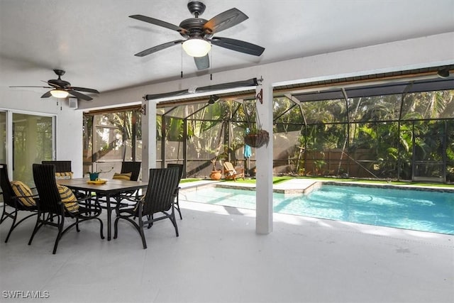 view of pool with a lanai and a patio area