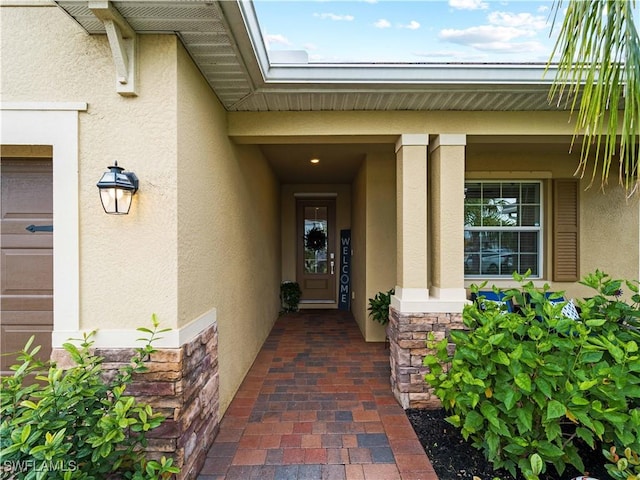 property entrance with a garage