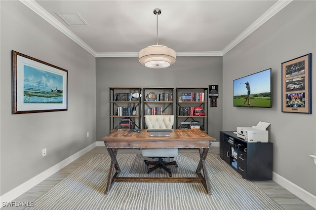 office space featuring light hardwood / wood-style floors and ornamental molding