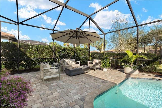 view of pool with an outdoor hangout area, a lanai, and a patio area