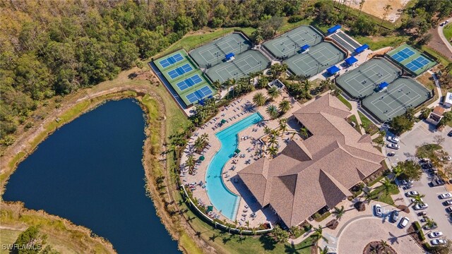 birds eye view of property featuring a water view