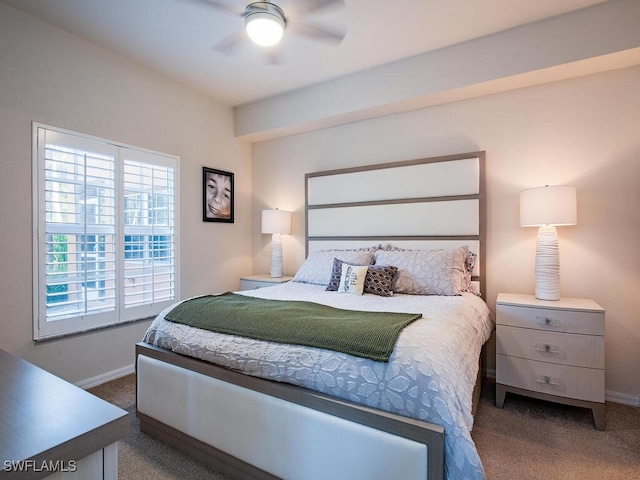 carpeted bedroom featuring ceiling fan