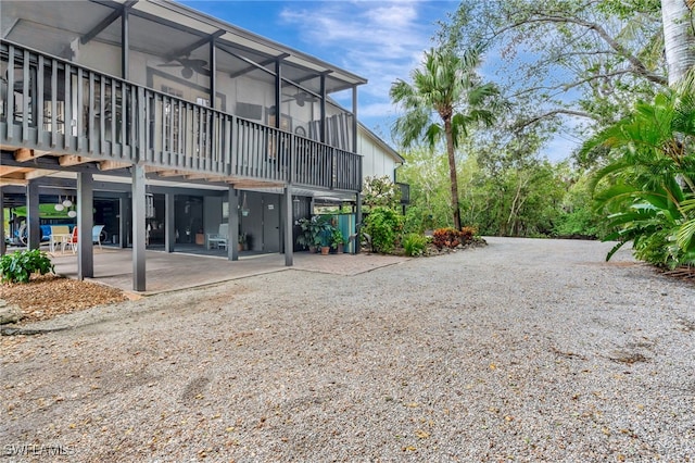 2511 Estey Ave Unit E4, Naples, FL 34104 - back of property featuring a patio area