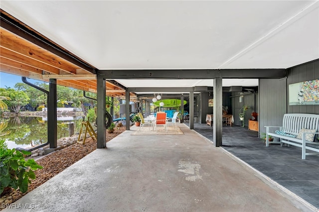 2511 Estey Ave Unit E4, Naples, FL 34104 - view of patio / terrace with a water view