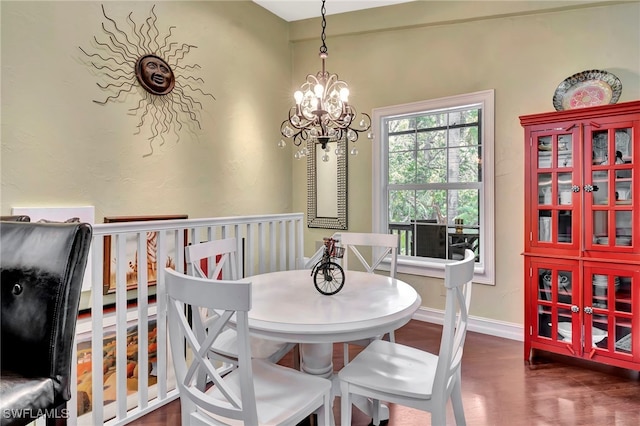 2511 Estey Ave Unit E4, Naples, FL 34104 - dining space featuring a chandelier and wood finished floors