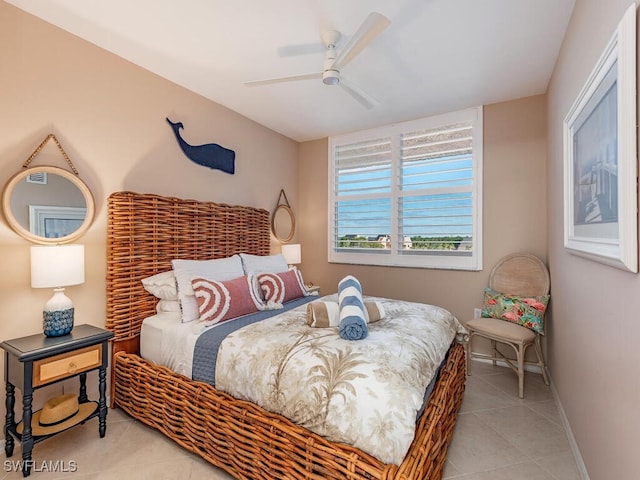 tiled bedroom with ceiling fan