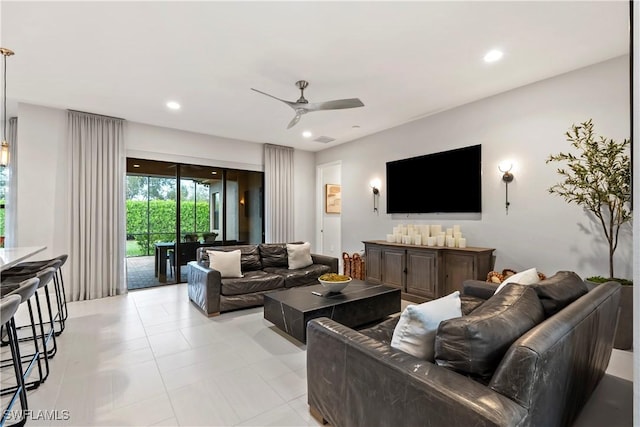 living room featuring ceiling fan