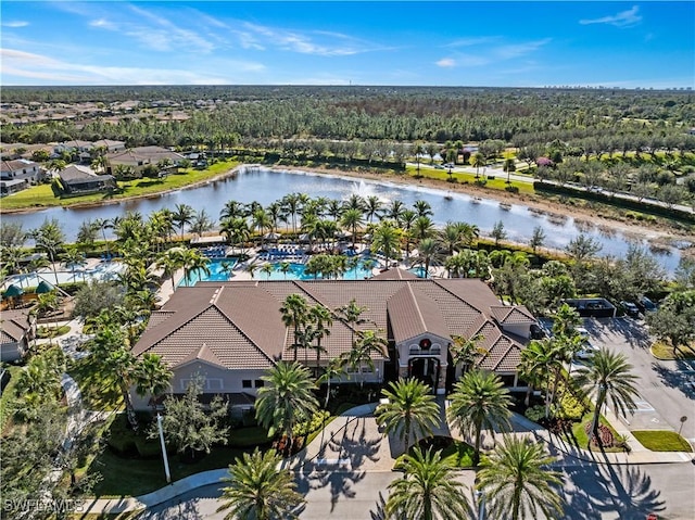 birds eye view of property featuring a water view