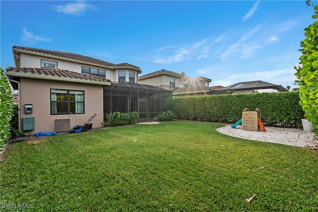 view of yard featuring a lanai