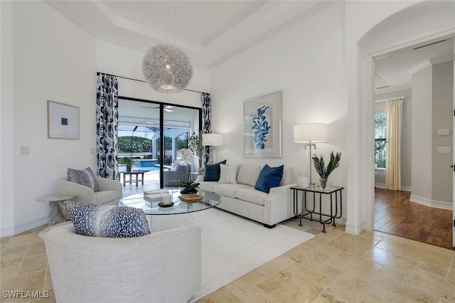 living room featuring crown molding