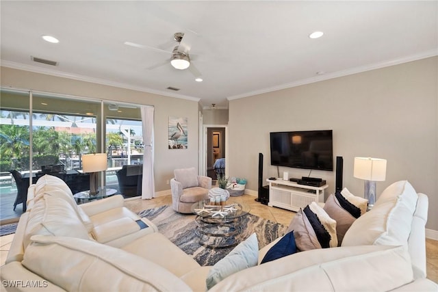 living room with ceiling fan, light tile patterned floors, and ornamental molding