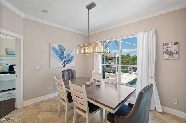 dining area with ornamental molding and light tile patterned flooring