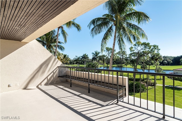 balcony featuring a water view