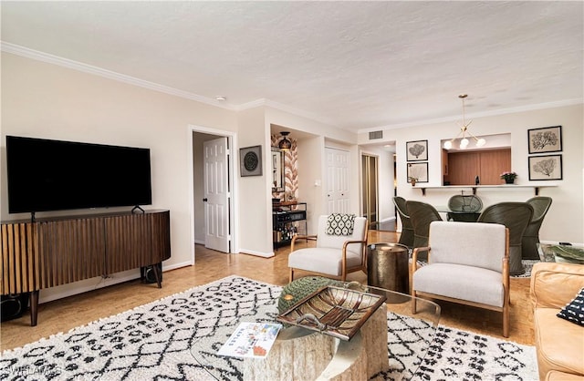 living room with a textured ceiling and ornamental molding