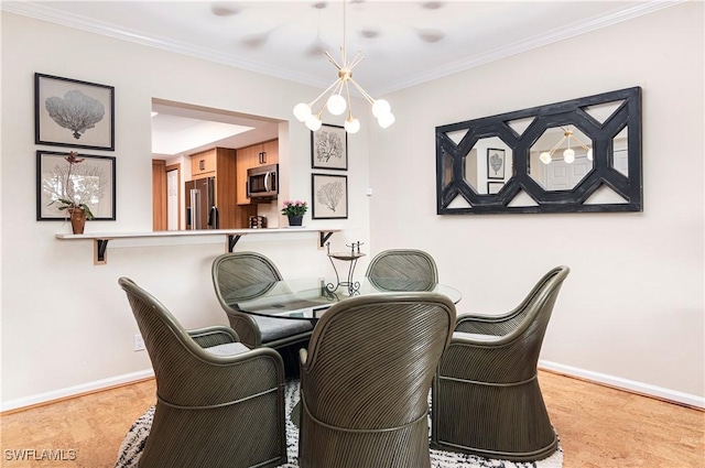 dining area with an inviting chandelier and crown molding