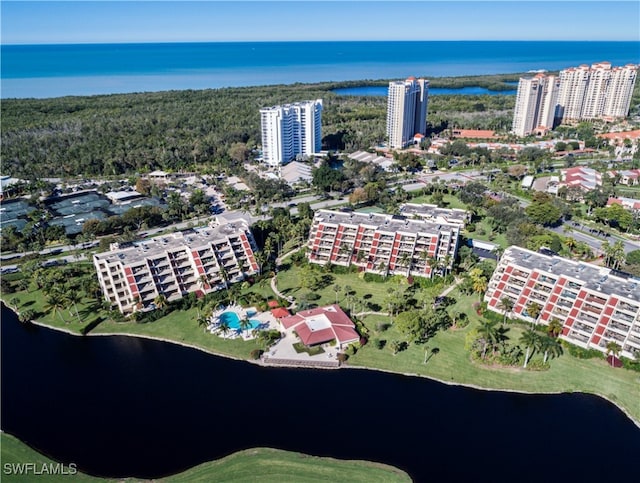 birds eye view of property featuring a water view