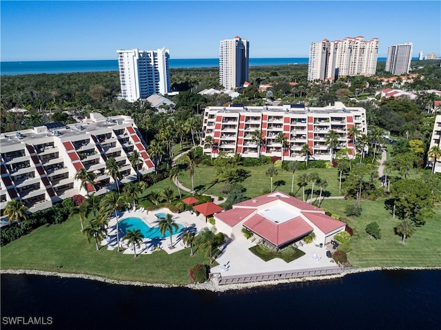 birds eye view of property featuring a water view