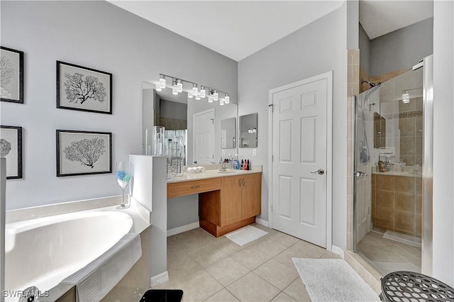 bathroom with tile patterned flooring, vanity, and independent shower and bath