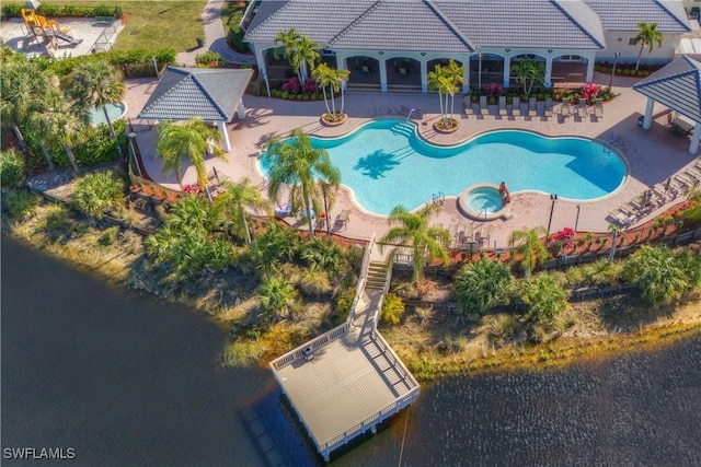 view of pool featuring a gazebo and a water view